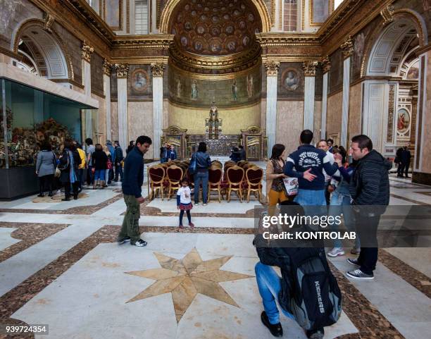 Tourists visit in the church of the Bourbon's in the real Palace of Naples, Southern italy, Campania Region.