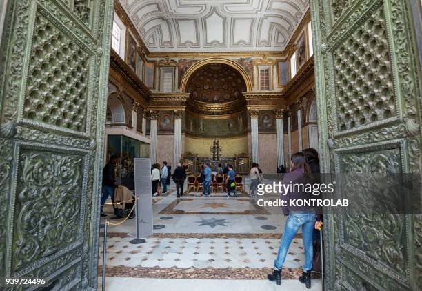 Tourists visit in the church of the Bourbon's in the real Palace of Naples, Southern italy, Campania Region.