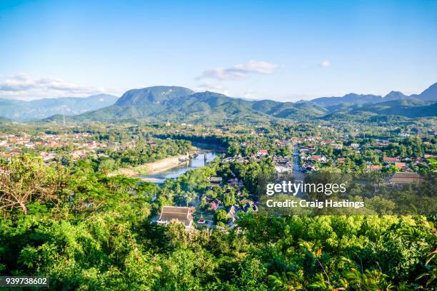 view of the luang prabang sky line city scape - luang prabang stock pictures, royalty-free photos & images
