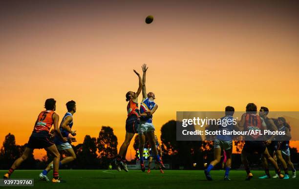 James Westphal of the Calder Cannons and Jas Corless of the Eastern Ranges compete for the ball during the round two TAC Cup match between Calder and...
