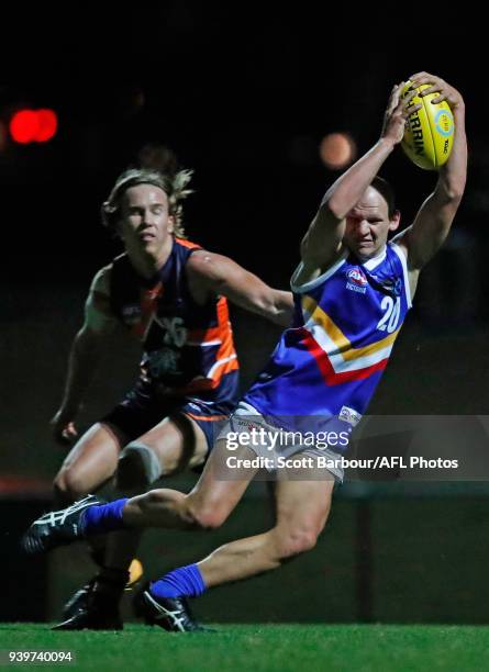 Ben Cardamone of the Eastern Ranges runs with the ball during the round two TAC Cup match between Calder and Eastern Ranges at RAMS Arena on March...