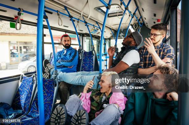rude behaviour in the public bus - irritation stock pictures, royalty-free photos & images