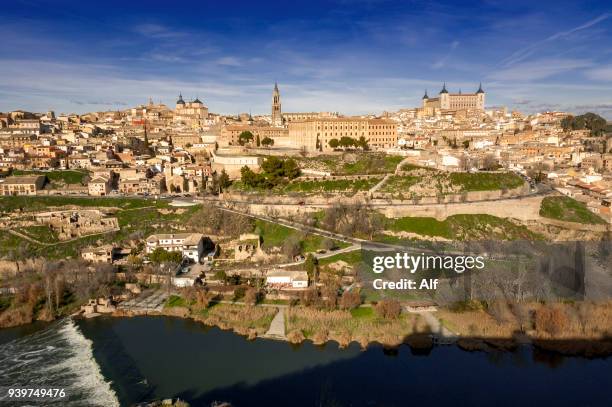 panoramic view of the imperial city of toledo, spain - toledo cathedral stock pictures, royalty-free photos & images