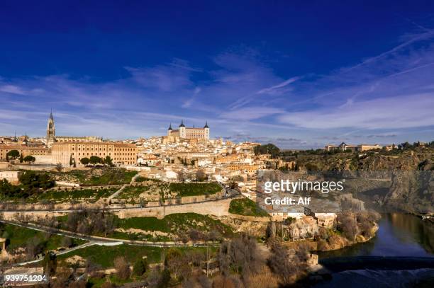 panoramic view of the imperial city of toledo, spain - toledo cathedral stock pictures, royalty-free photos & images