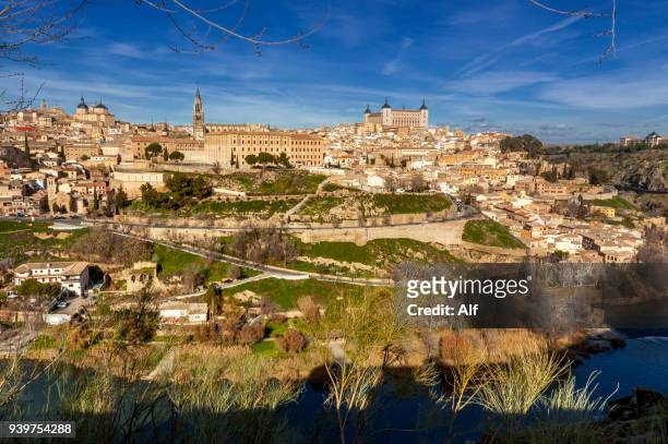 panoramic view of the imperial city of toledo, spain - toledo cathedral stock pictures, royalty-free photos & images