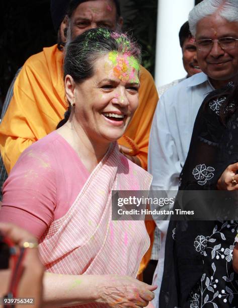 Chairperson of the Congress-led UPA government and Congress Party President Sonia Gandhi celebrates "Holi" with party leaders in New Delhi