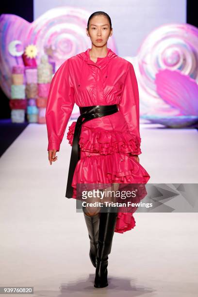 Model walks the runway at the Mercedes-Benz presents Sudi Etuz show during Mercedes Benz Fashion Week Istanbul at Zorlu Performance Hall on March 29,...