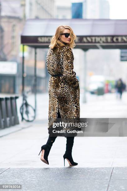 Rosie Huntington-Whiteley is seen wearing an Attica coat with a Gucci fanny pack in Chelsea on March 29, 2018 in New York City.