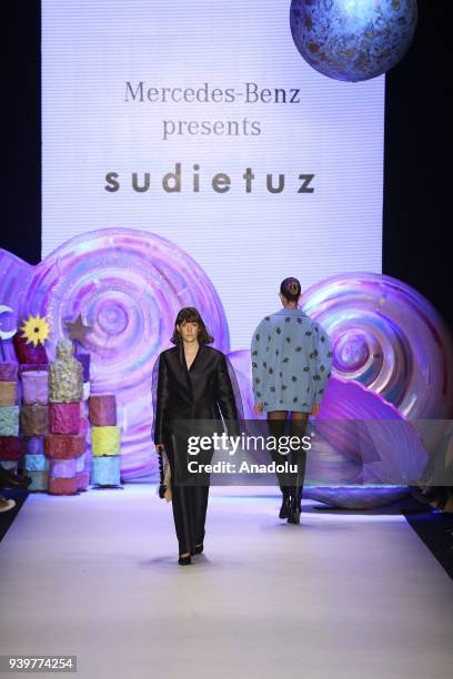 Model presents a creation of designer Sudi Etuz during the Mercedes-Benz Fashion Week/Fall Season 2018 at the Zorlu Performing Arts Center in...