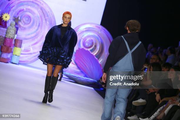 Model presents a creation of designer Sudi Etuz during the Mercedes-Benz Fashion Week/Fall Season 2018 at the Zorlu Performing Arts Center in...