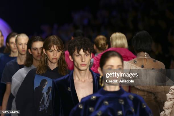 Models present a creation of designer Sudi Etuz during the Mercedes-Benz Fashion Week/Fall Season 2018 at the Zorlu Performing Arts Center in...