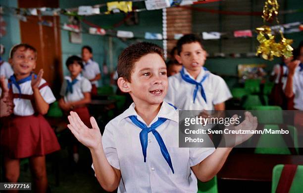Elian Gonzalez , attends sings in his class on his 8th birthday, on December 6 in Cardenas, Cuba. Elian Gonzalez, the survivor of a 1999...
