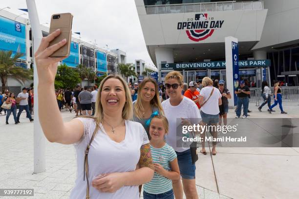 From left, Tayler Buslepp, Rachelle Austin, Kennadi Wilson and Sue Buslepp take a selfie before the start of the 2018 Opening Day baseball game...