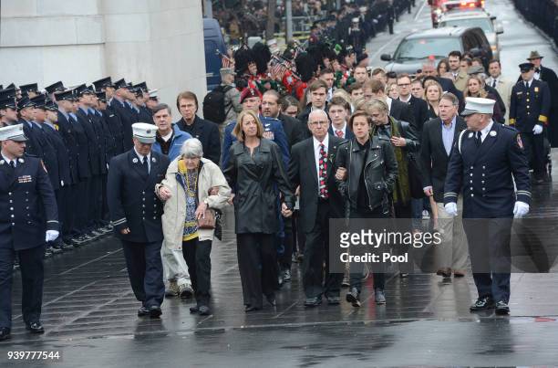 The family of FDNY Fire Marshal Capt. Christopher "Tripp" Zanetis arrives for his funeral in Washington Square Park March 29, 2018 in New York City....