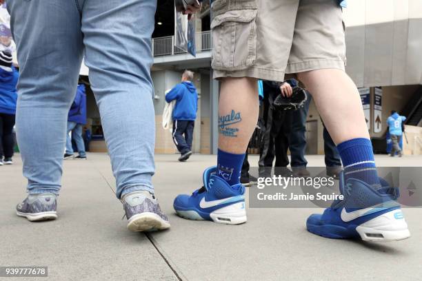 Fan with a Royals tattoo enters the stadium prior to the game between the Chicago White Sox and the Kansas City Royals on Opening Day at Kauffman...