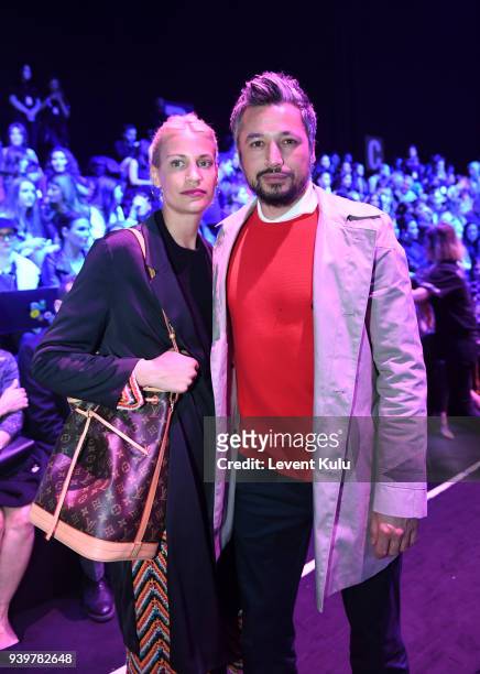 Celina and Ilhan Mansiz attend the Sudi Etuz show during Mercedes-Benz Istanbul Fashion Week on March 29, 2018 in Istanbul, Turkey.