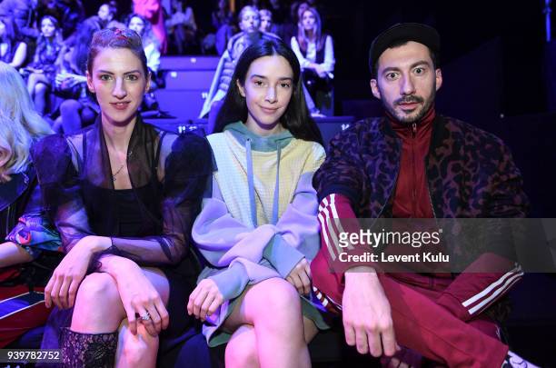 Zeynep Soylu, Simay Yilmaz and Alexander Koko attend the Sudi Etuz show during Mercedes-Benz Istanbul Fashion Week on March 29, 2018 in Istanbul,...