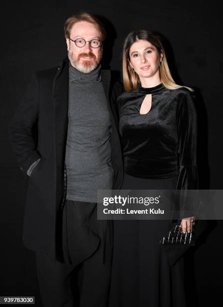 Yildiray Sahinler and Gizem Sahinler attend the Sudi Etuz show during Mercedes-Benz Istanbul Fashion Week on March 29, 2018 in Istanbul, Turkey.