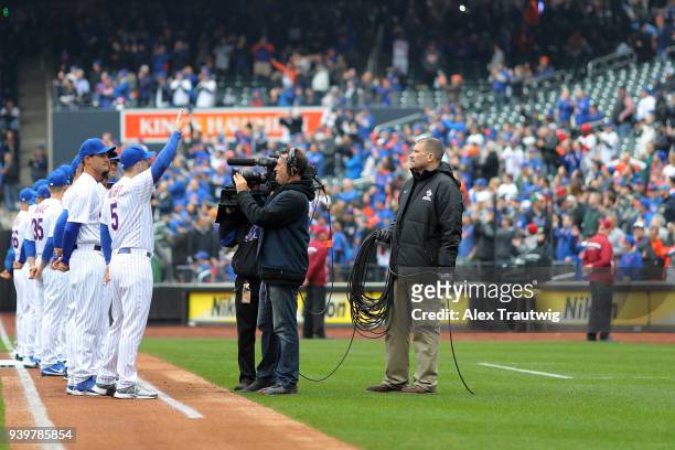 David Wright of the New York Mets acknowledges the crowd during player introductions prior to the game against the St. Louis Cardinals at Citi Field...