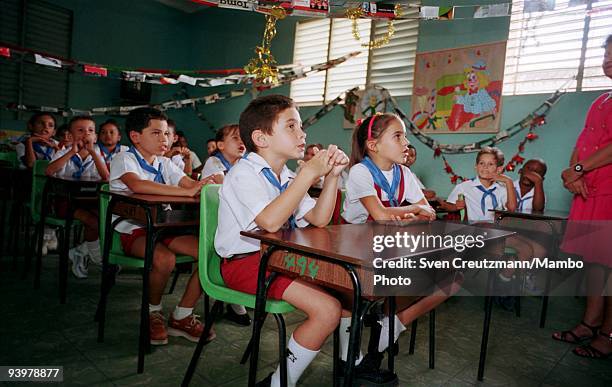Elian Gonzalez , attends class on his 8th birthday, on December 6 in Cardenas, Cuba. Elian Gonzalez, the survivor of a 1999 Thanksgiving-week...