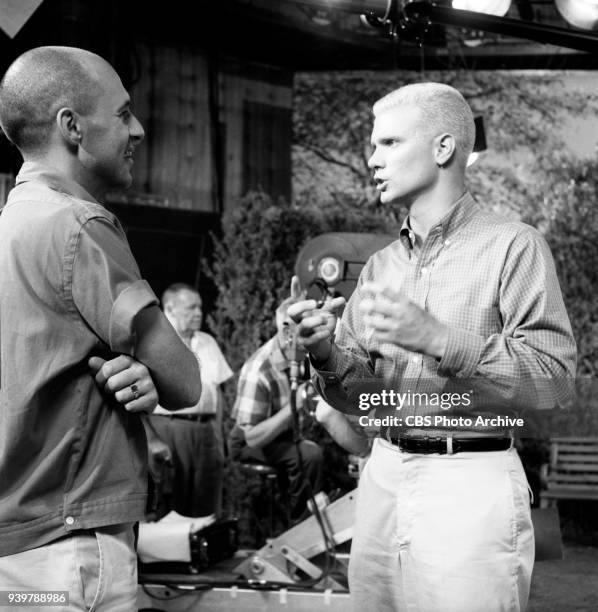 Television sitcom, The Many Loves of Dobie Gillis, episode: Greater Love Hath No Man. Left to right, director-producer Rod Amateau and Dwayne Hickman...