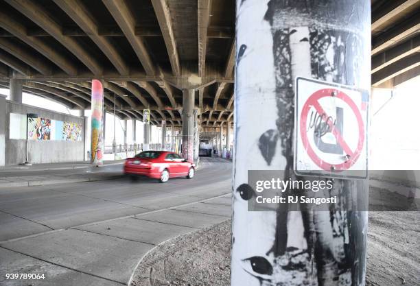 Car passes under Interstate 70 near the 46th Ave Underpass on March 29, 2018 in Denver, Colorado. A 10-mile stretch of I-70 between Brighton...