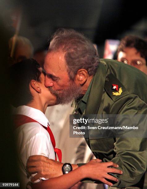 Cuban President Fidel Castro hugs and kisses Elian Gonzalez, at a celebration the 5th anniversary of the day when Elian Gonzalez was released by U.S....