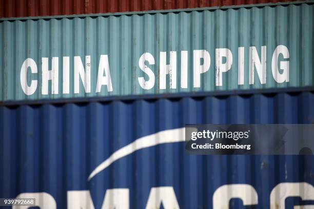 China Shipping Container Lines Co. Signage is displayed on a container at the Port of Los Angeles in Los Angeles, California, U.S., on Wednesday,...