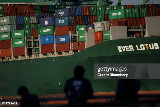 The Evergreen Marine Corp. Ever Lotus container ship sits docked at the Port of Los Angeles in Los Angeles, California, U.S., on Wednesday, March 28,...