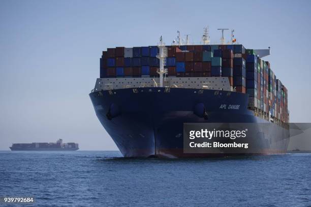 The APL Danube container ship approaches the Port of Los Angeles in Los Angeles, California, U.S., on Wednesday, March 28, 2018....