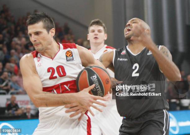 Andrea Cianciarini, #20 of AX Armani Exchange Olimpia Milan competes with Ricky Hickman, #2 of Brose Bamberg in action during the 2017/2018 Turkish...