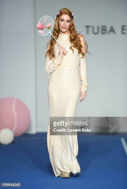 Model walks the runway for the Tuba Ergin show during Mercedes Benz Fashion Week Istanbul at Zorlu Performance Hall on March 29, 2018 in Istanbul,...