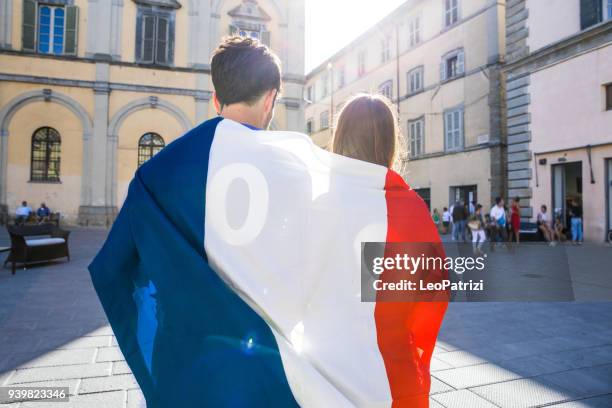 french fans watching and supporting their team at world competition football league - france supporter stock pictures, royalty-free photos & images