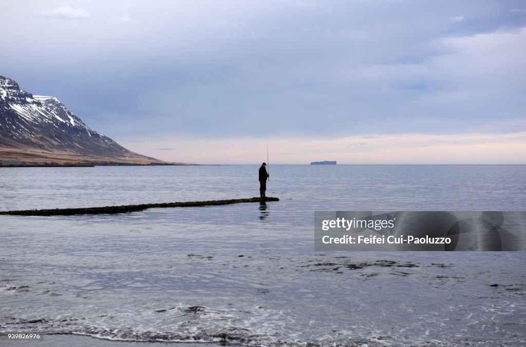 One Fisherman at Saudarkrokur, north Iceland