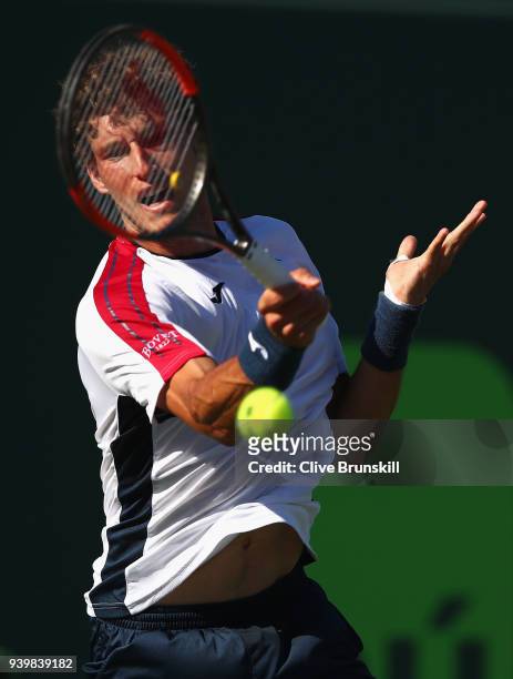Pablo Carreno Busta of Spain plays a forehand against Kevin Anderson of South Africa in their quarterfinal during the Miami Open Presented by Itau at...