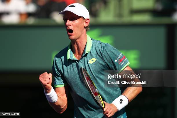 Kevin Anderson of South Africa celebrates a point against Pablo Carreno Busta of Spain in their quarterfinal during the Miami Open Presented by Itau...