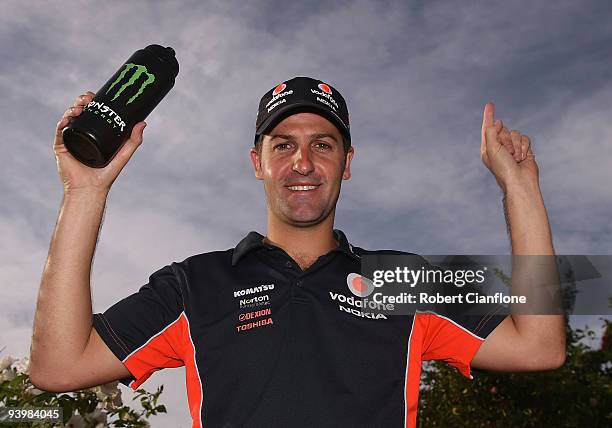 Jamie Whincup driver of the Team Vodafone Ford poses after he won the championship during race 25 for the Sydney 500 Grand Finale, which is round 14...