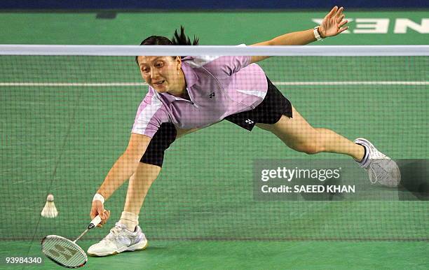 Netherland's Yao Jie returns to Wong Mew Choo of Malaysia in the first women's semi-final match at the Badminton World Super Series Masters Finals in...