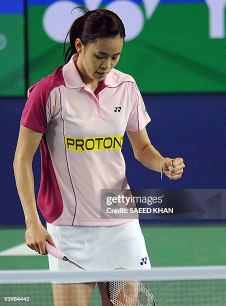 Wong Mew Choo of Malaysia celebrates her victory over Yao Jie of the Netherlands in the first women's semi-final match at the Badminton World Super...