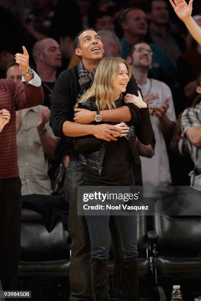 Ellen Pompeo and Chris Ivery attend a game between the Miami Heat and the Los Angeles Lakers at Staples Center on December 4, 2009 in Los Angeles,...