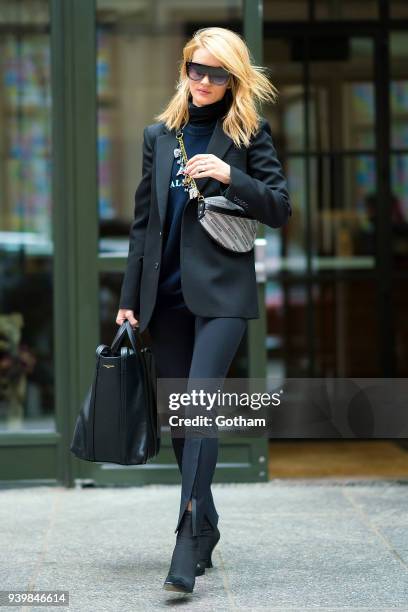 Rosie Huntington-Whiteley is seen wearing an Balenciaga, Wardrobe.NYC and Celine in SoHo on March 29, 2018 in New York City.