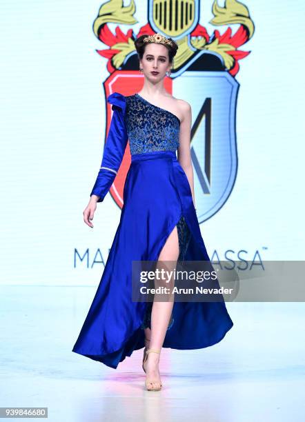 Model walks the runway wearing Madame Adassa at 2018 Vancouver Fashion Week - Day 7 on March 25, 2018 in Vancouver, Canada.