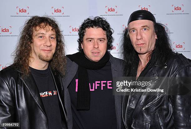 Director Sacha Gervasi with Anvil band members Lips and Rob Reiner attend the International Documentary Association's 25th Annual Awards Ceremony on...