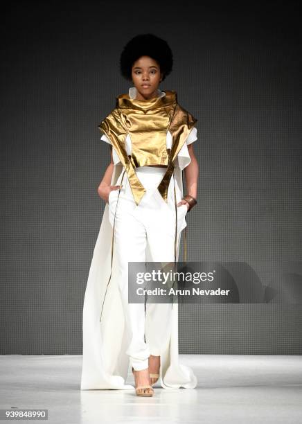 Model walks the runway wearing Nevena Kragic at 2018 Vancouver Fashion Week - Day 7 on March 25, 2018 in Vancouver, Canada.