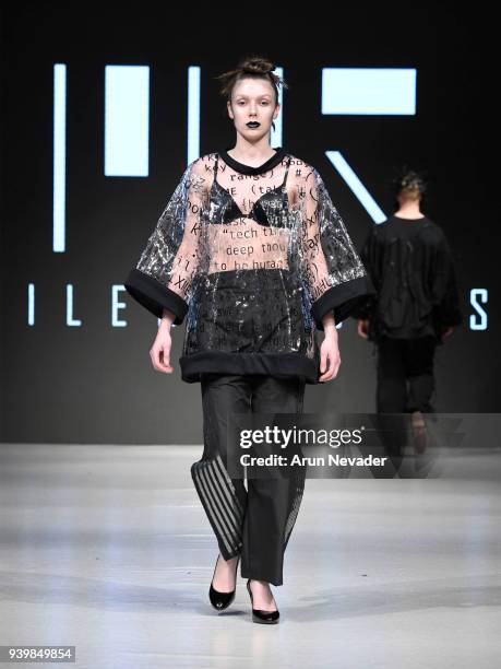 Model walks the runway wearing Milena Rojas at 2018 Vancouver Fashion Week - Day 7 on March 25, 2018 in Vancouver, Canada.