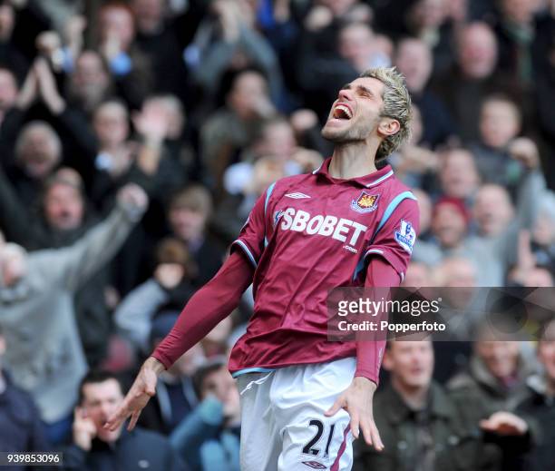 Valon Behrami of West Ham celebrates after scoring their first goal during the Barclays Premier League match between West Ham United and Hull City at...
