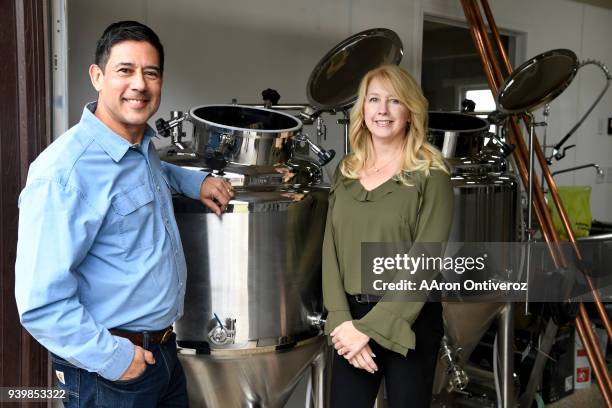 Keith and Jodi Villa pose for a picture at the headquarters for Ceria Beverages on Thursday, March 29, 2018. Keith Villa is the creator of Blue Moon,...