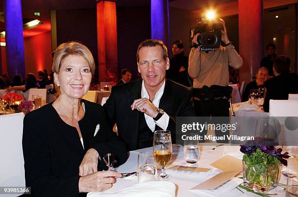 Henry Maske and Christiane Hoerbiger attend the 'ARD Advent Dinner' on December 4, 2009 in Munich, Germany.