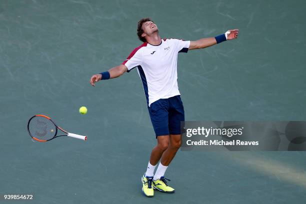 Pablo Carreno Busta celebrates match point against Kevin Anderson during their quarterfinal match on Day 11 of the Miami Open Presented by Itau at...