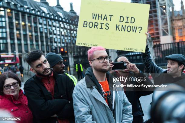 BeLeave and Cambridge Analytica whistleblowers Shahmir Sanni and Chris Wylie attend an emergency demonstration in Parliament Square on the...